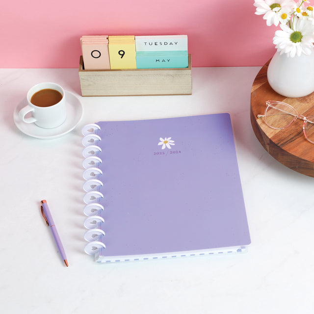 A lifestyle shot of the Life Is Sweet Big 12 month Planner by Happy Planner