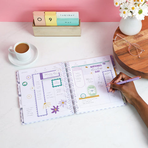 Image of A lifestyle shot of the Life is Sweet Classic 12 month planner by Happy Planner