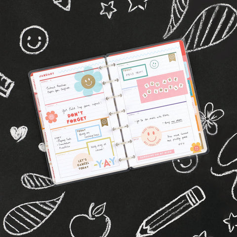 Image of A lifestyle shot of the Super Happy Mini 12 month planner by Happy Planner