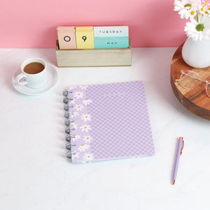 Lifestyle shot of the Life is Sweet Classic Notebook by Happy Planner
