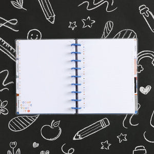 Lifestyle shot of the Teacher Notes Classic Fill Paper inserted into a Happy Planner